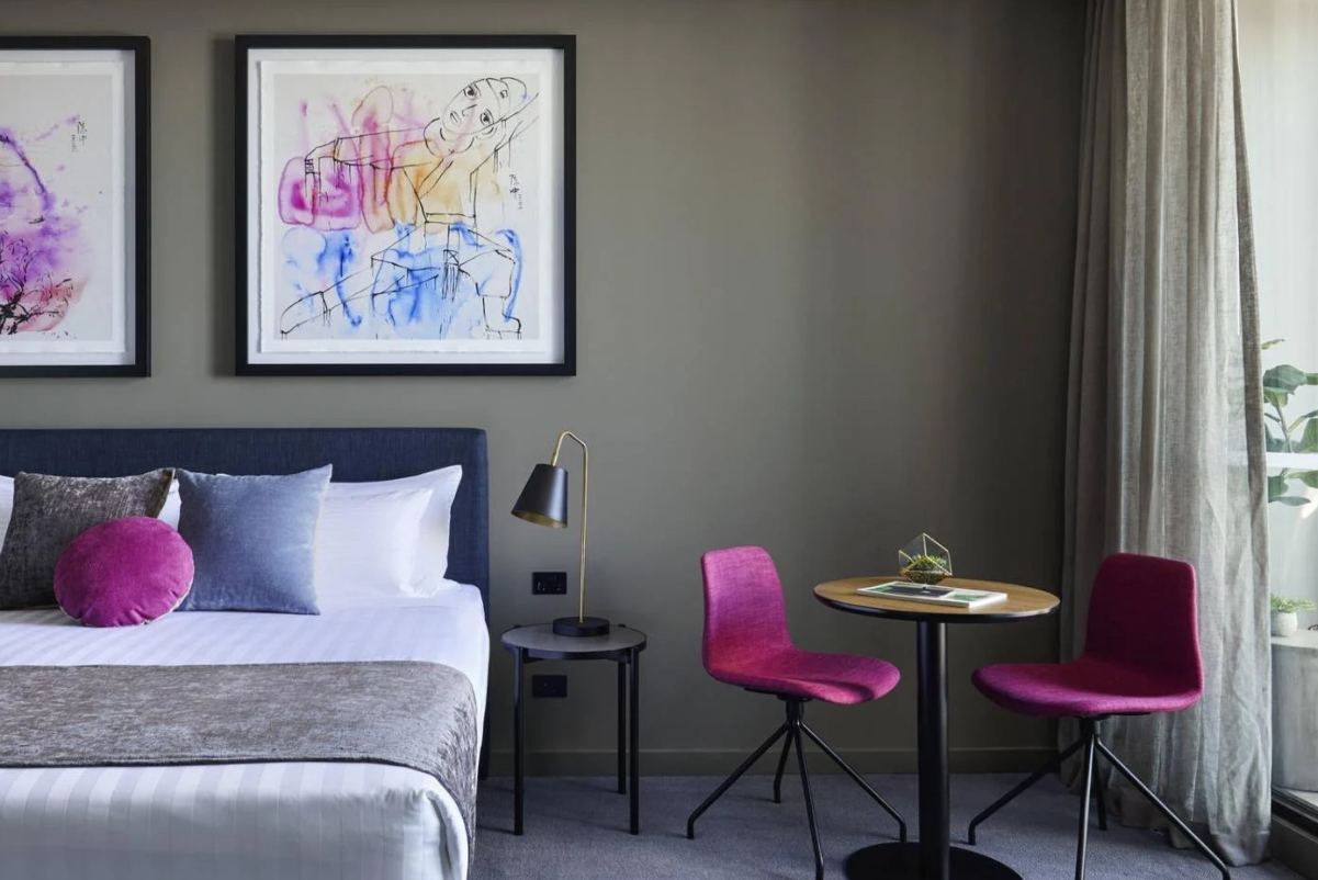 A guest room with art at The Chen Melbourne, an Art Series Hotel.