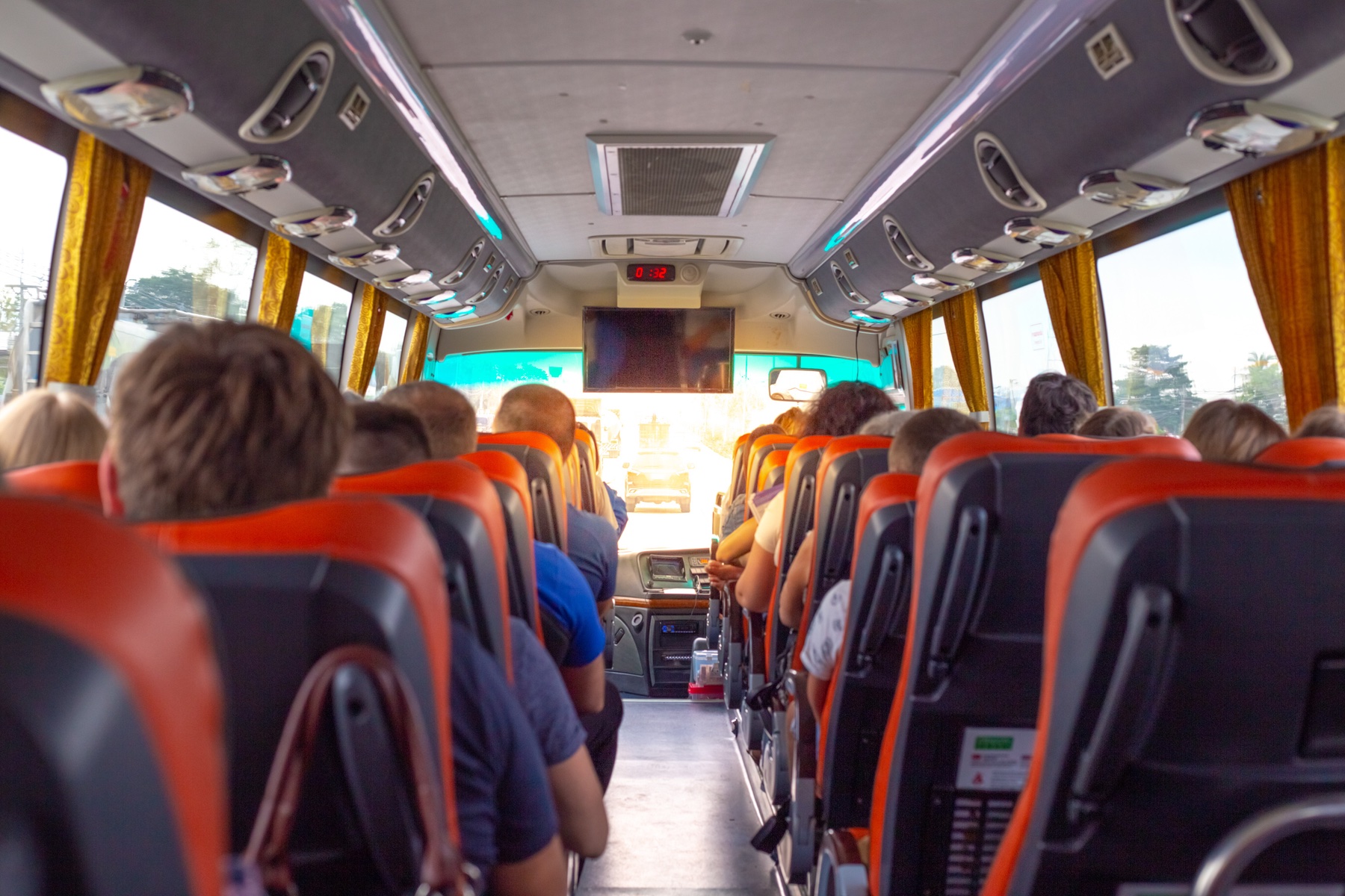 Tourists ride a bus on an excursion. Cox & Kings' new owner looks to integrate advanced technology to offer travellers tailor-made journeys. 