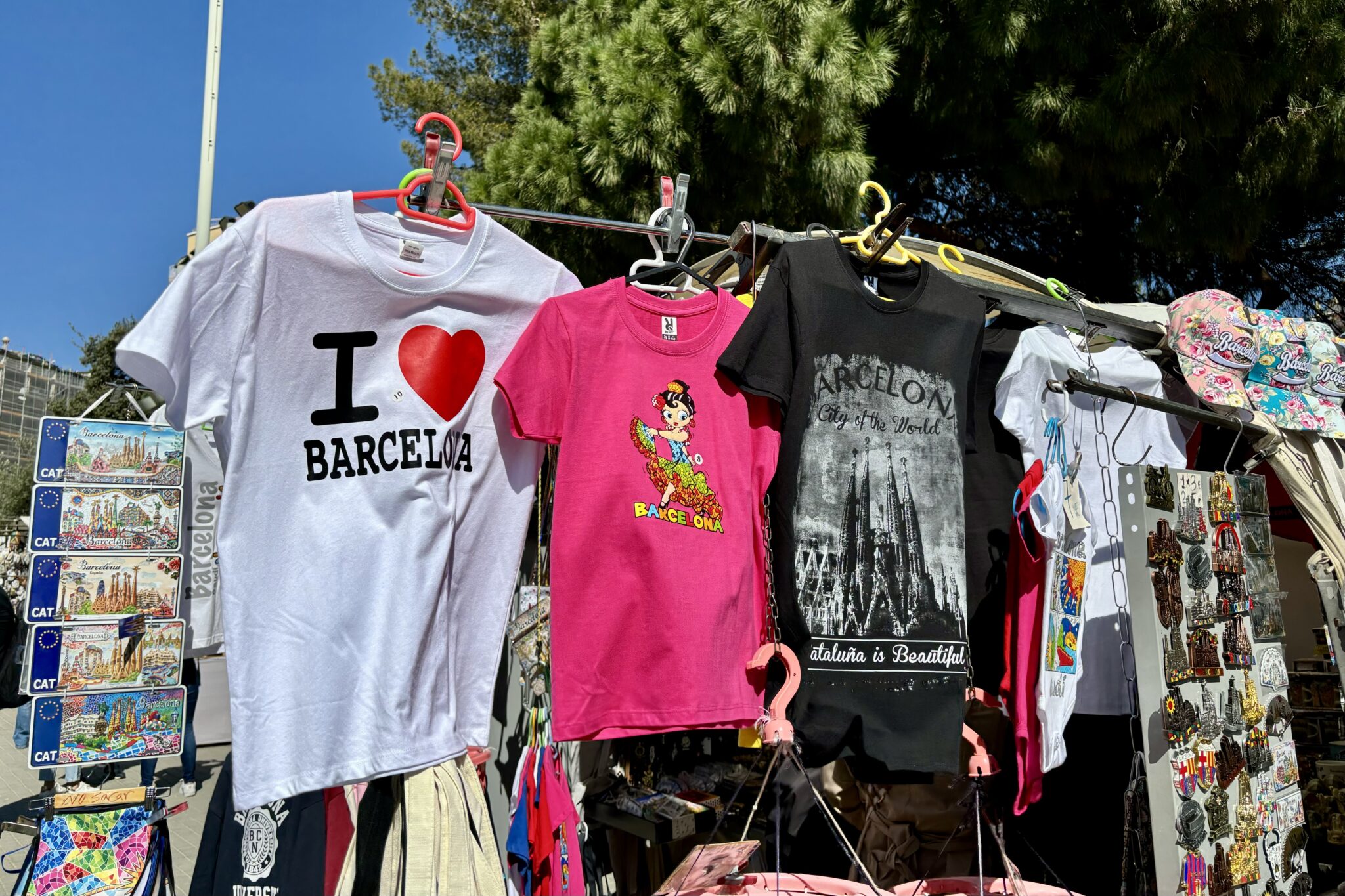 A tourist trinket and t-shirt stall near the Sagrada Familia cathedral in Barcelona, Spain. 